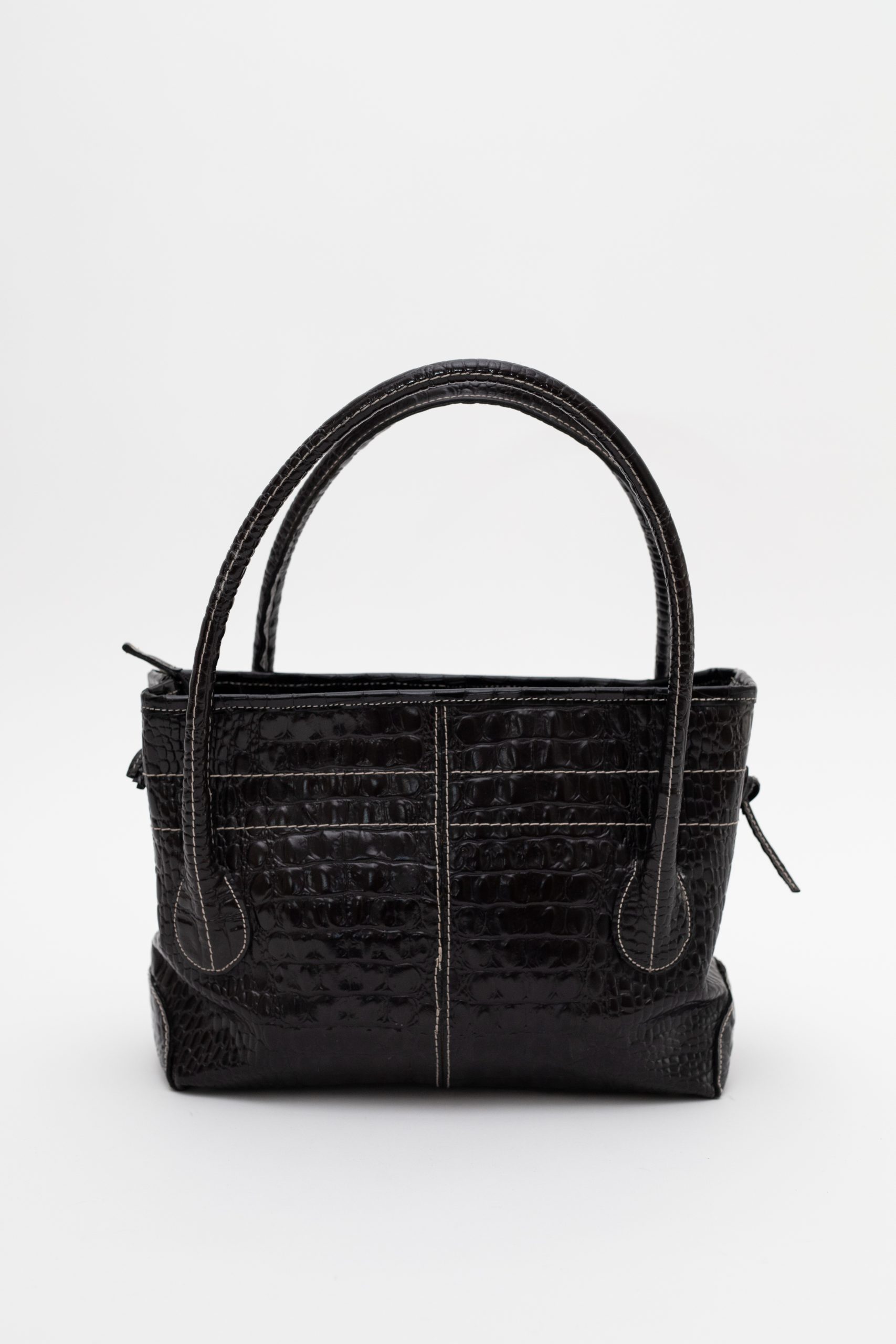 Tods aligator pozadi
