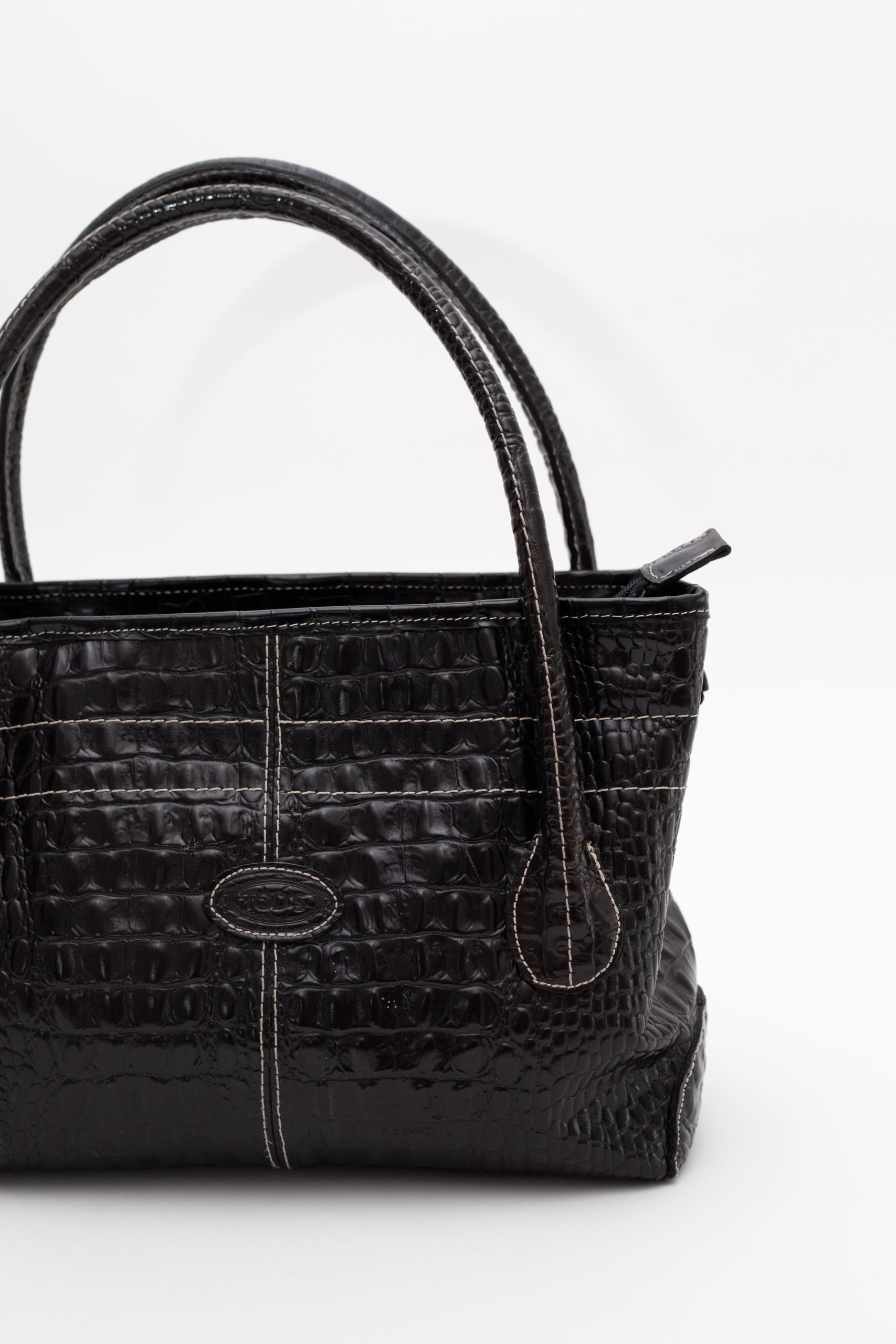 Tods aligator znak napred